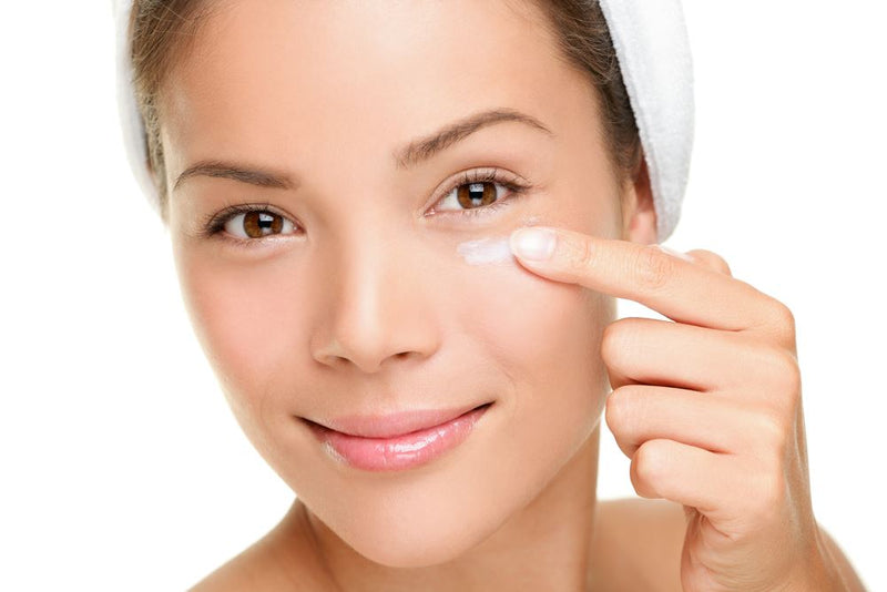 Jar of eye cream arranged for a skin-care routine