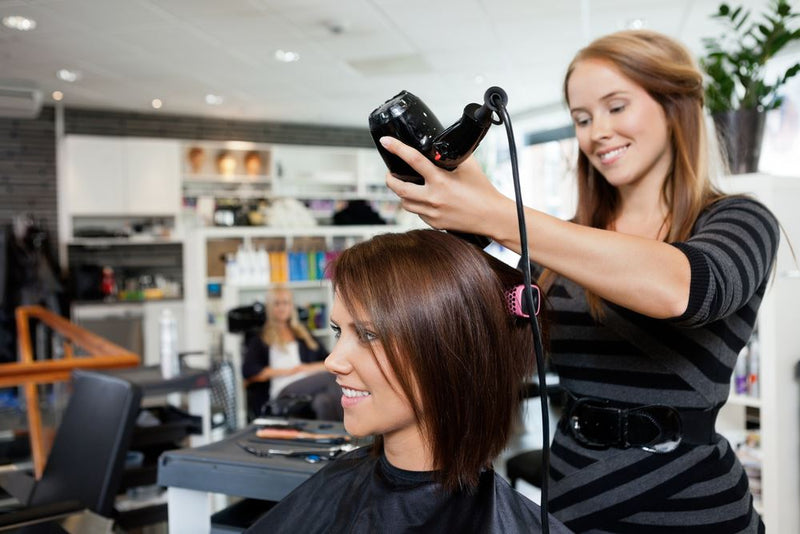 Hairdresser working with a client in a beauty salon