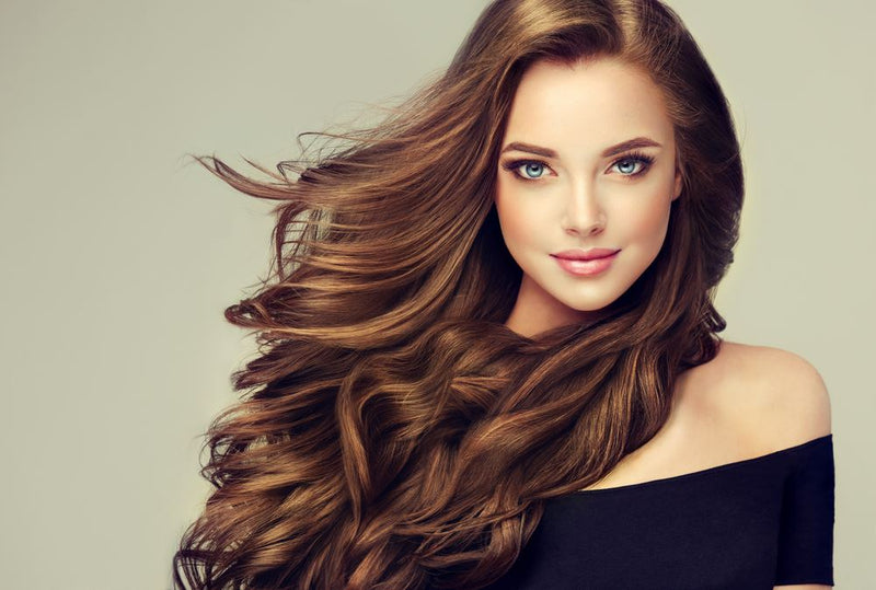 Woman displaying luminous, healthy-looking hair