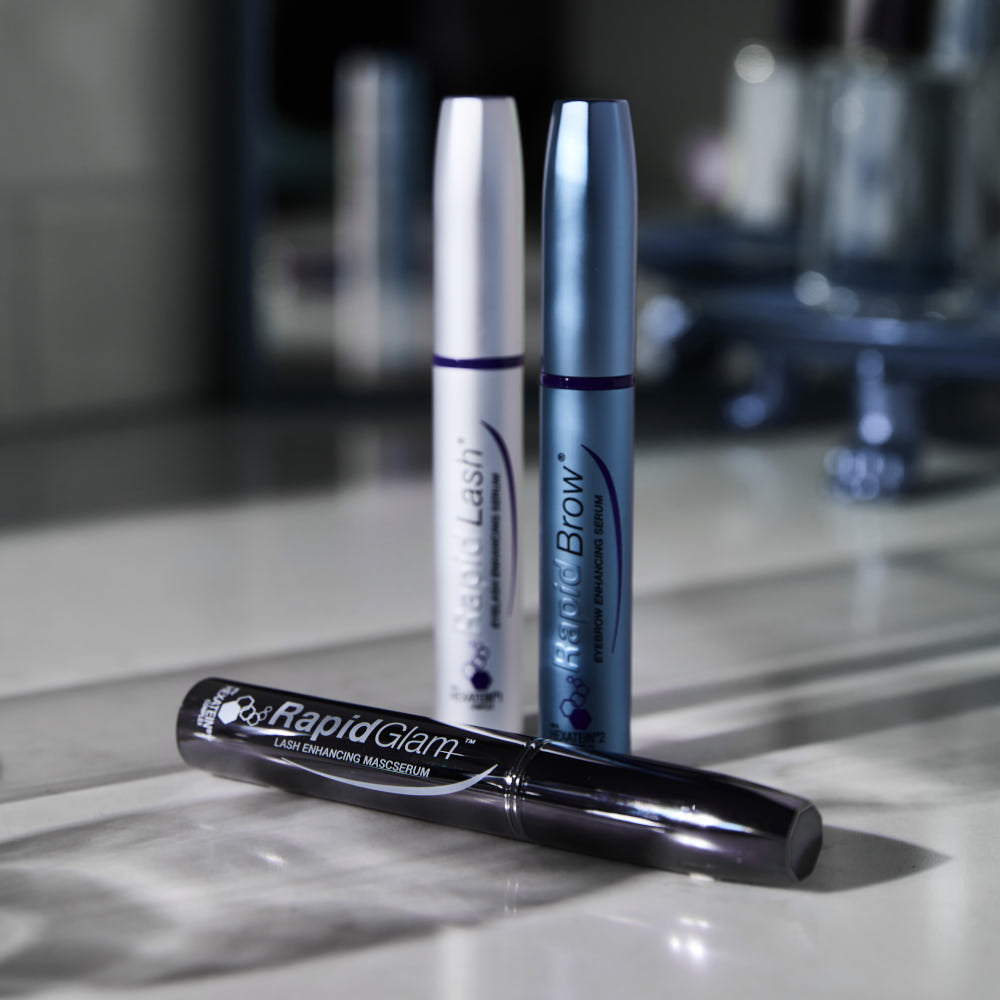 RapidLash®, RapidBrow®, and RapidGlam™ products on a salon background