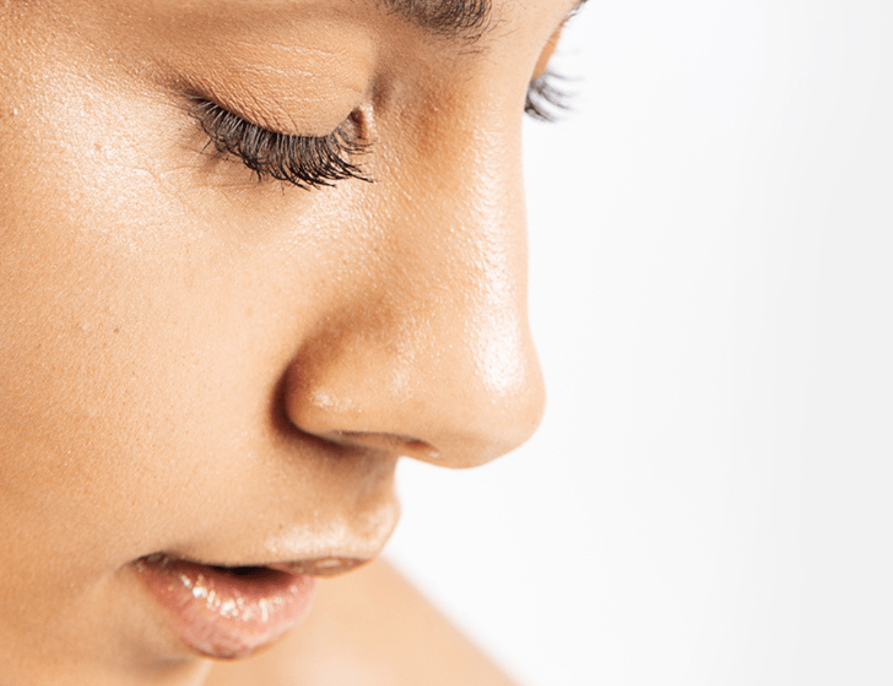 Close up photo of a model's face, with eyes closed